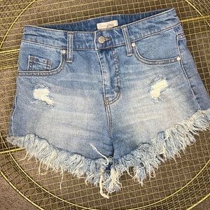 Wonderly distressed blue Jean shorts with fringe